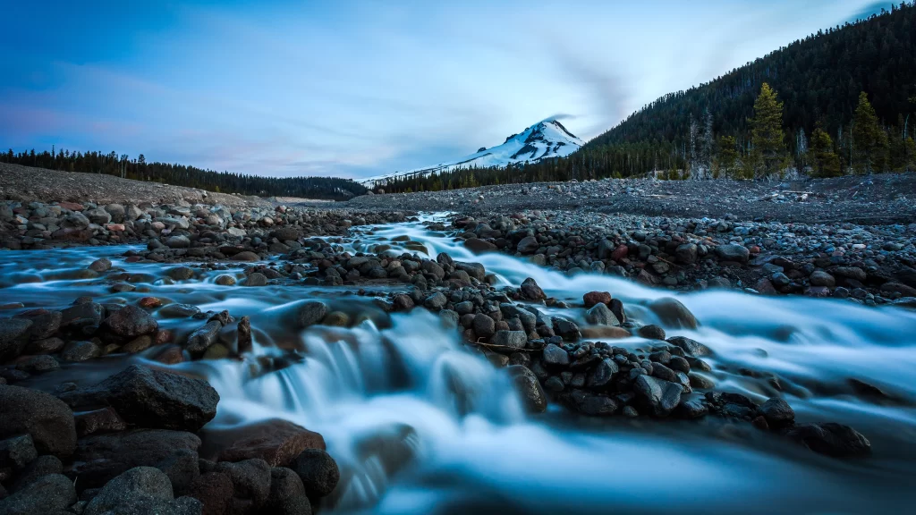 mountain river rocks forest snow twilight