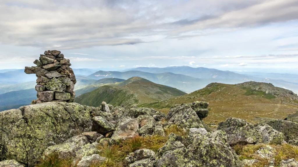mountain rocks landscape clouds sky