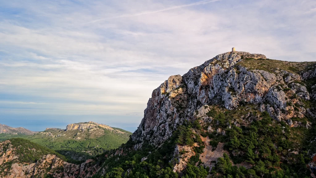 mountain rocky landscape vegetation sky