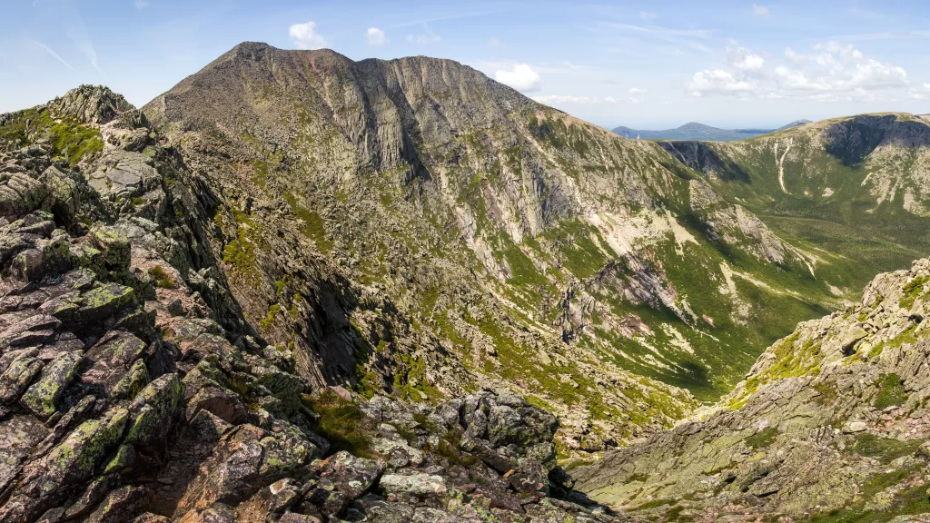 mountainous landscape rocky terrain greenery clear sky