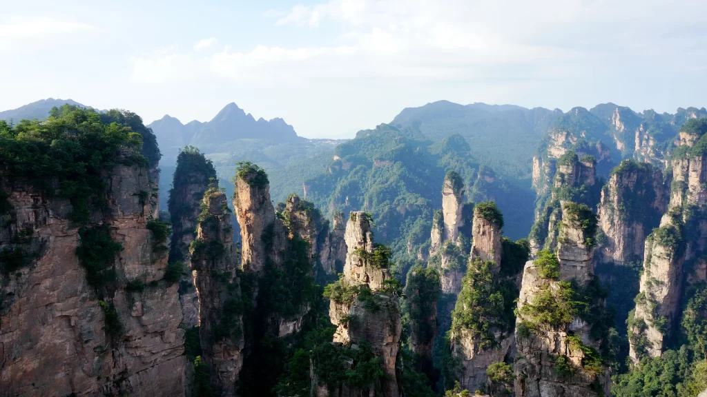mountains cliffs greenery sky landscape natural