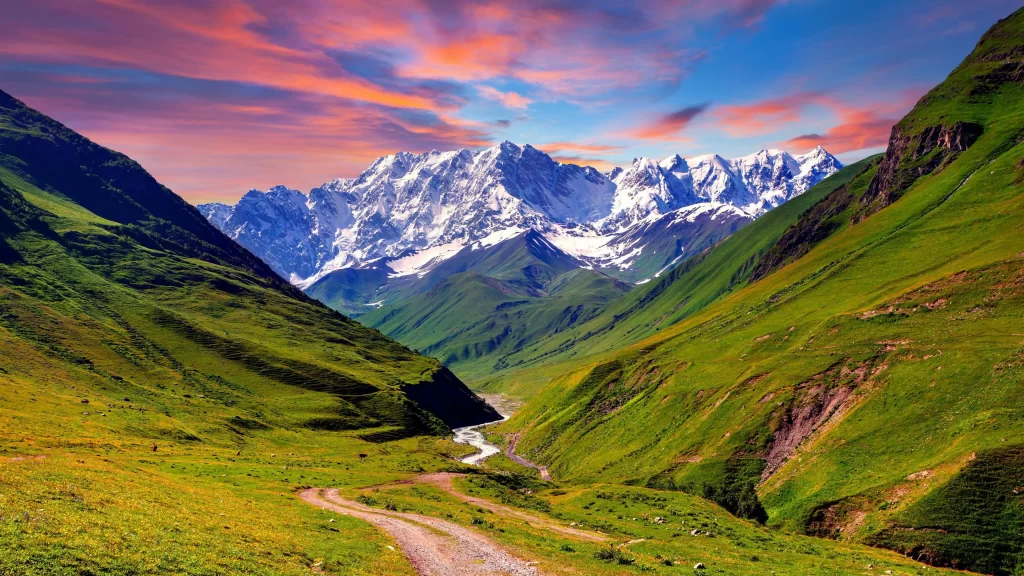 mountains green valley river sky sunset
