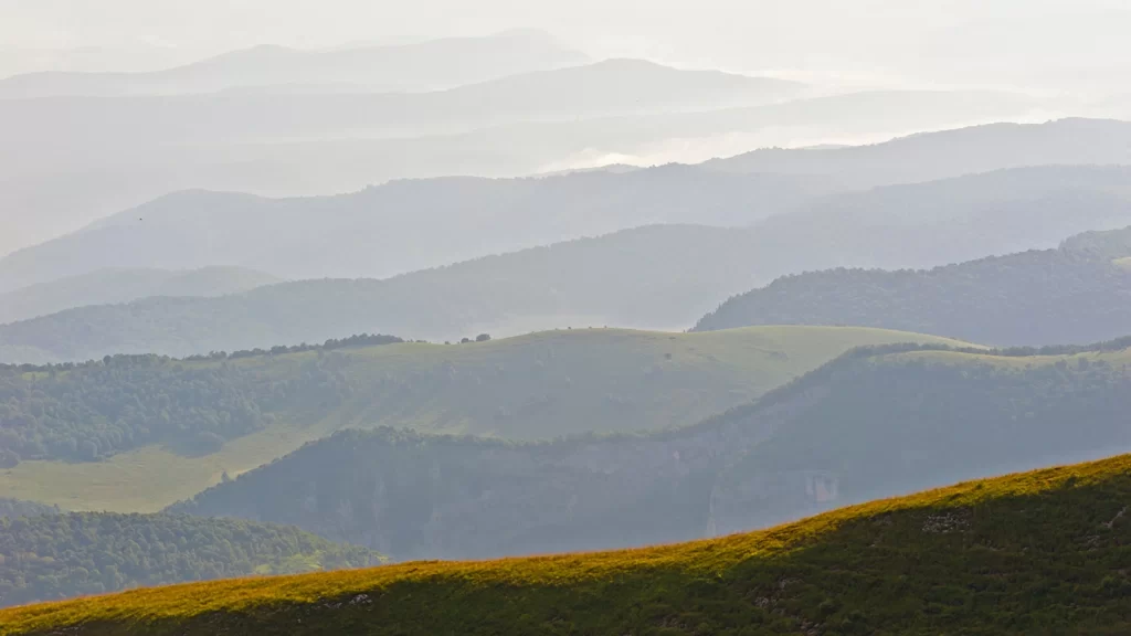 mountains hills landscape nature green sunlight