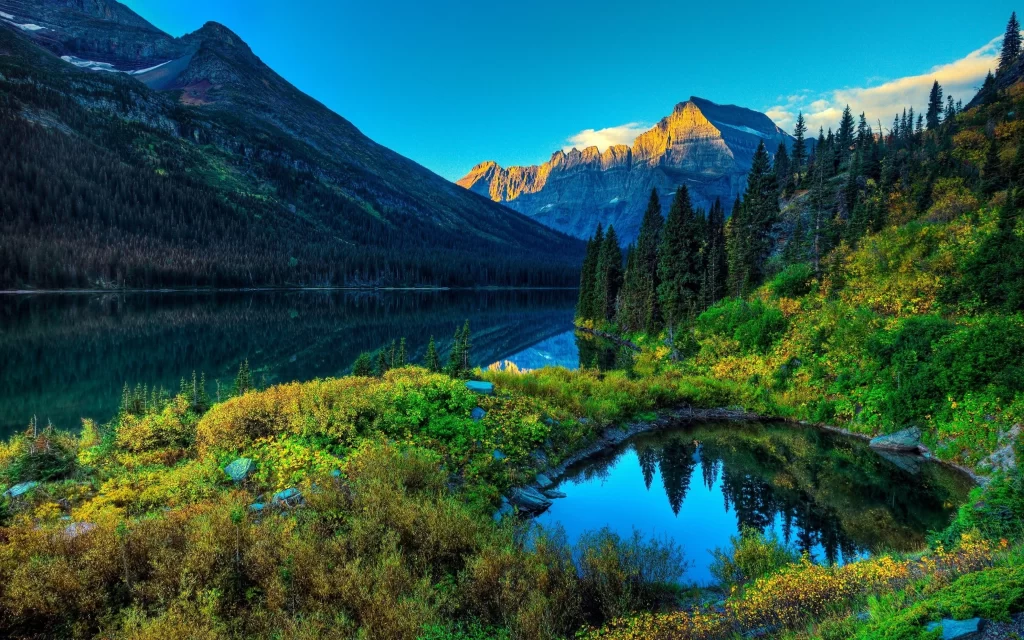 mountains lake forest reflection sunlight