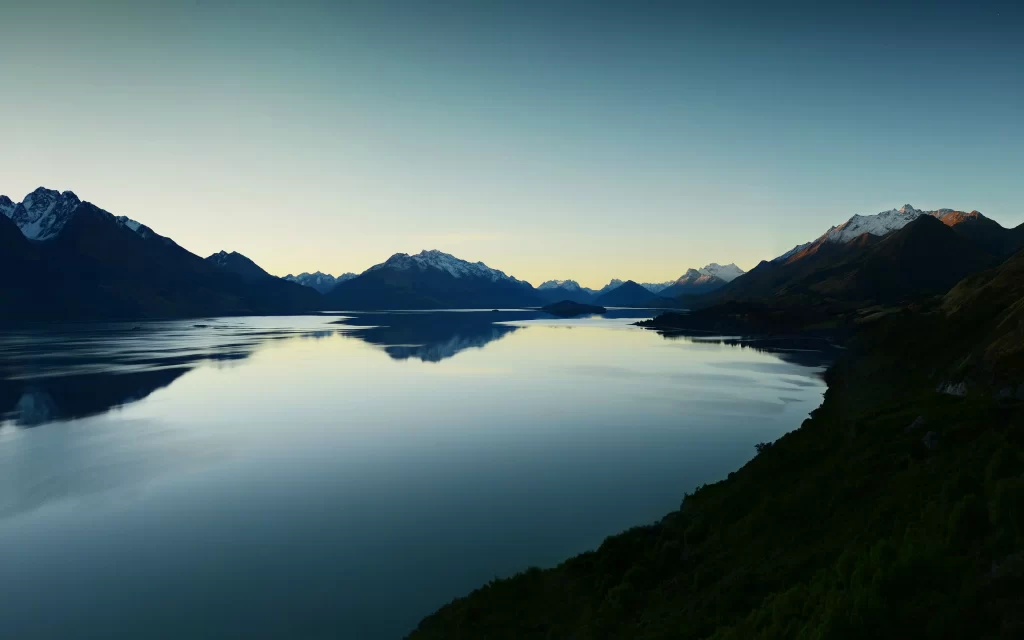 mountains lake reflection sky sunrise nature