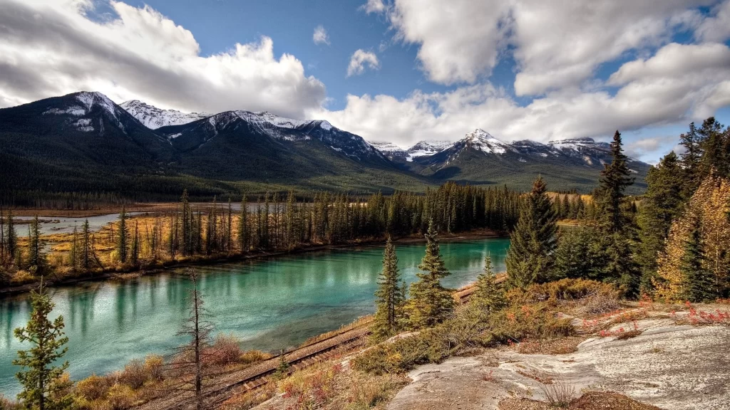 mountains river trees sky clouds landscape