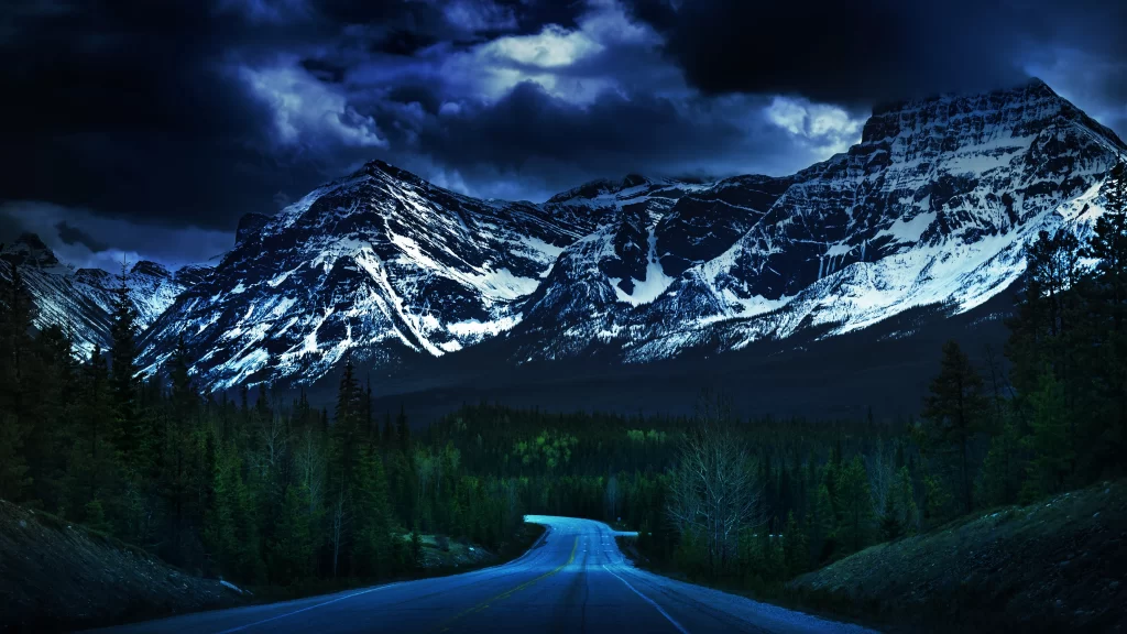 mountains road snow clouds night sky