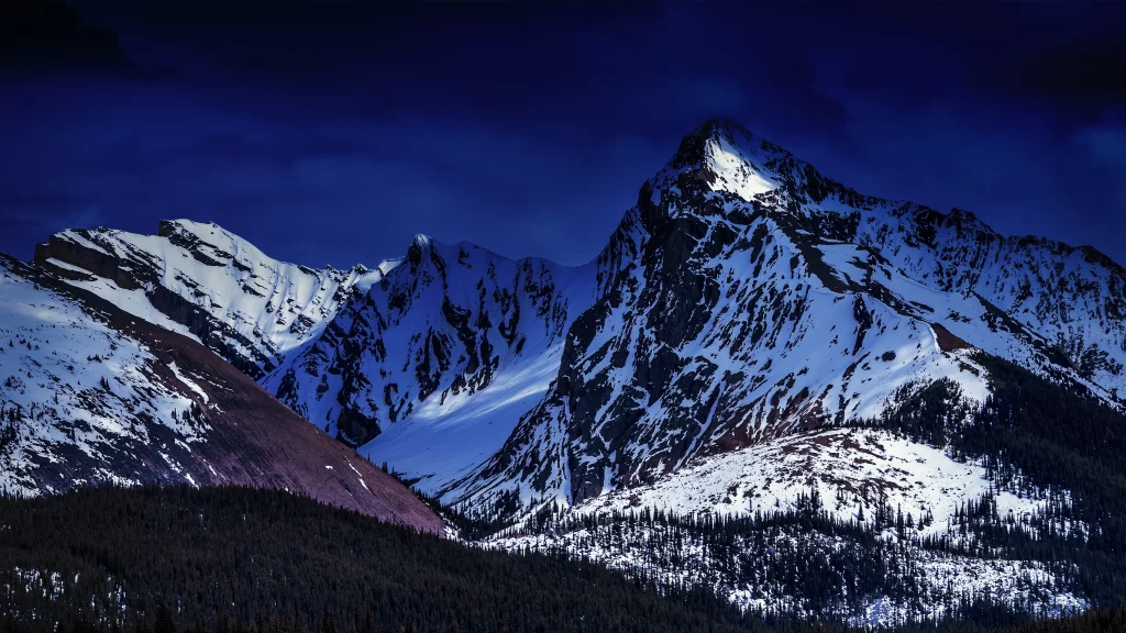 mountains snow night sky landscape serene