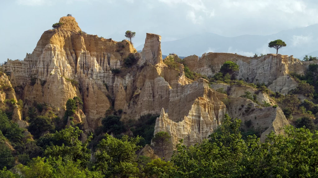 mountains trees sky clouds landscape nature