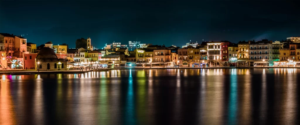 night cityscape reflections lights buildings water