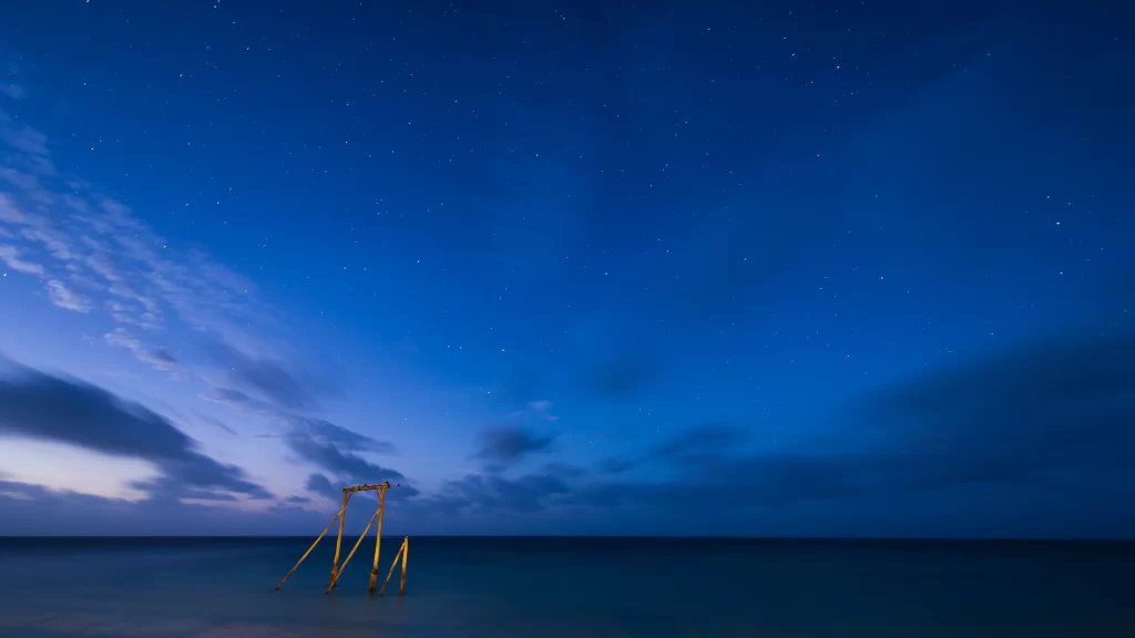night sky stars ocean horizon clouds