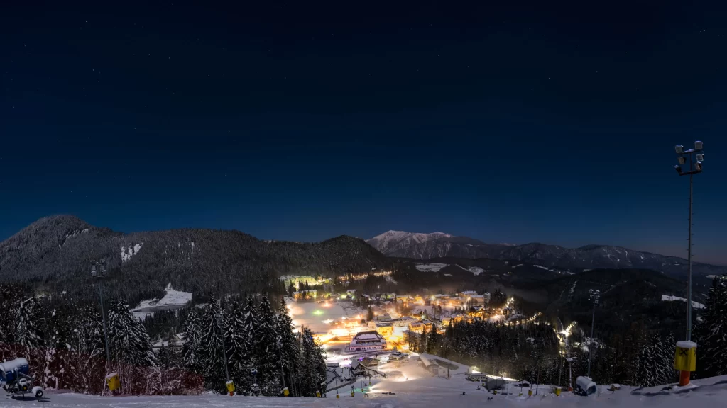 night snow mountain lights village ski