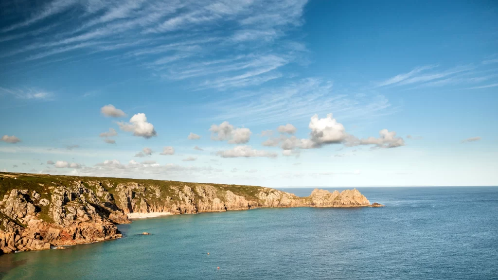 ocean cliffs sky clouds coastline landscape
