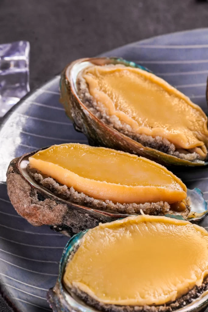 Oysters Open Yellow Flesh Blue Plate