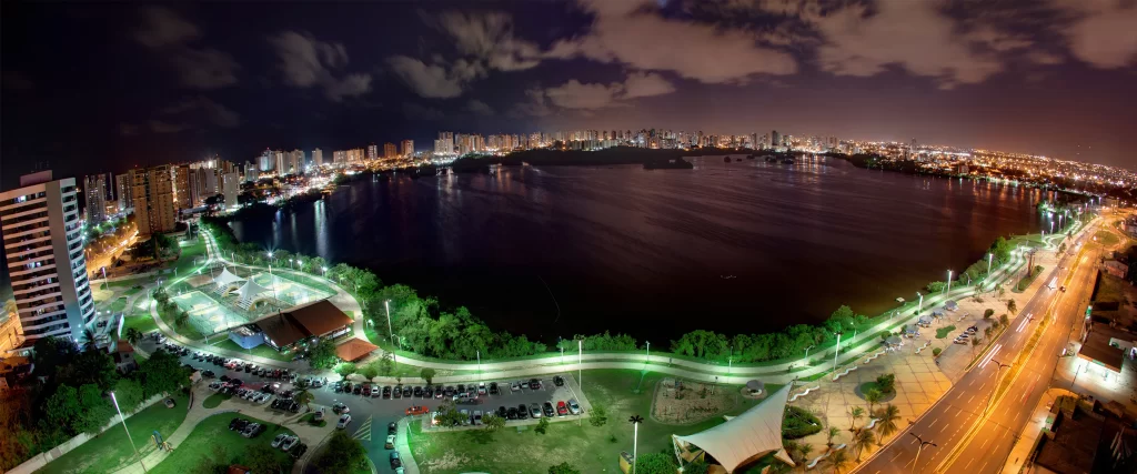panoramic night cityscape water skyline lights