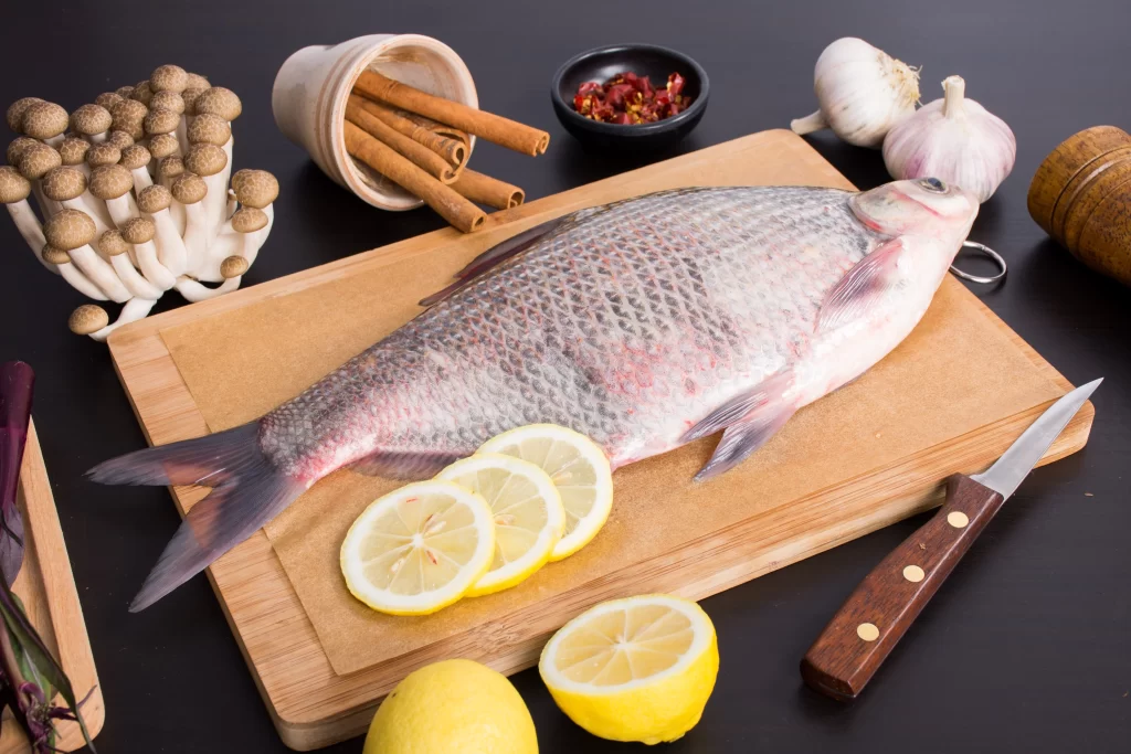 Raw Fish Whole Lemon Garlic Spices
