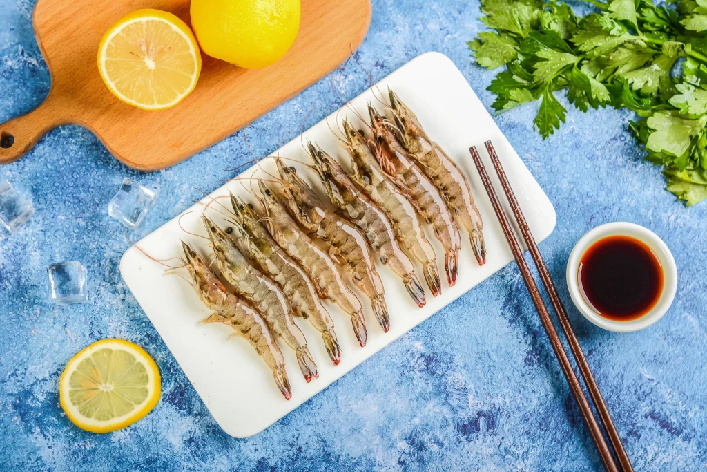Raw Shrimp Brown Color Blue Background