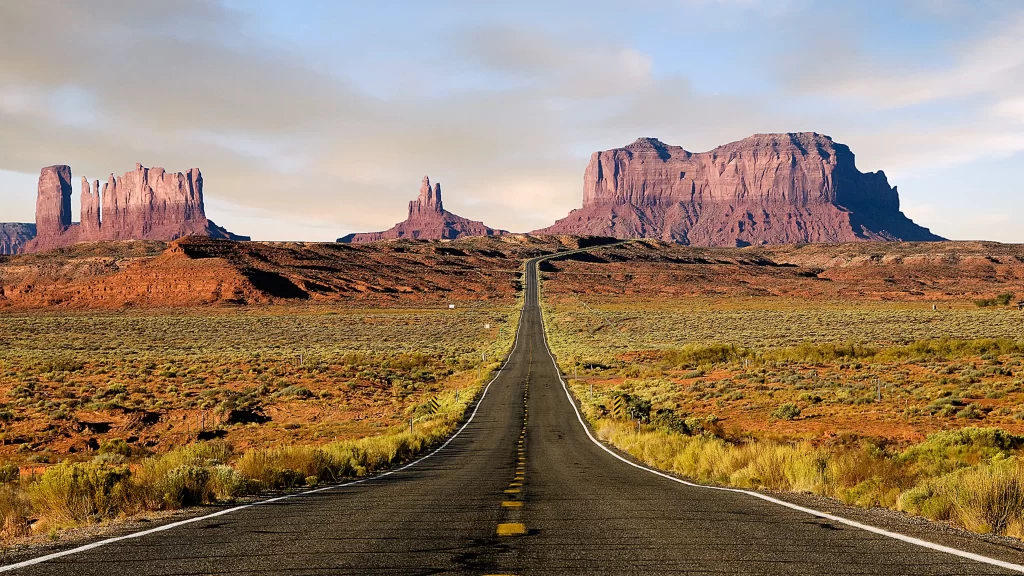road desert landscape mountains sky