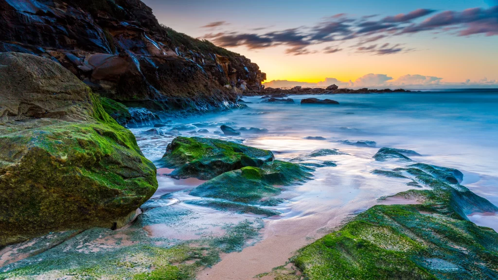 seaside rocks sunset sky ocean