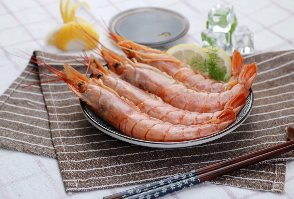 Shrimp Raw Orange Plate Brown Napkin