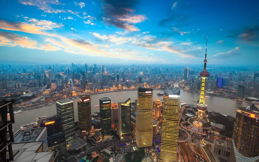 skyline cityscape skyscraper river sunset