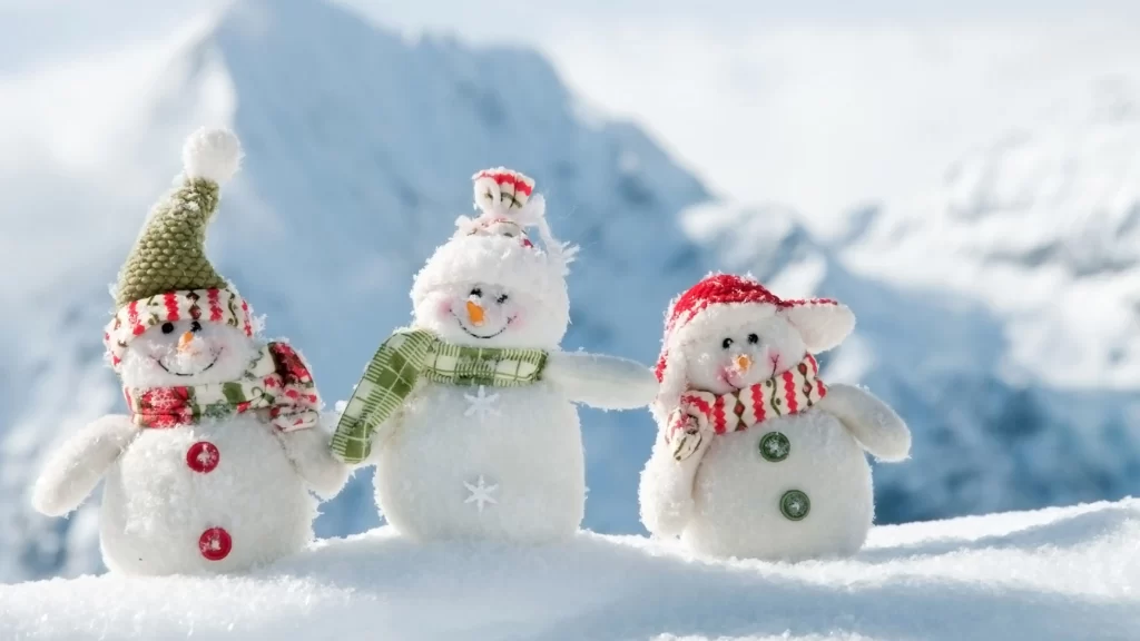 snowmen winter hats scarves snow