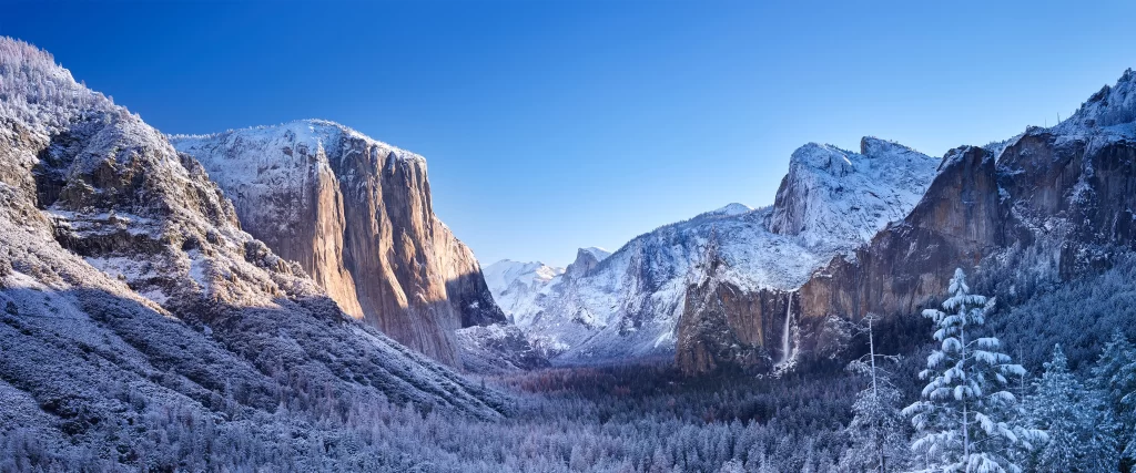 Snowy mountains clear sky serene landscape winter natural