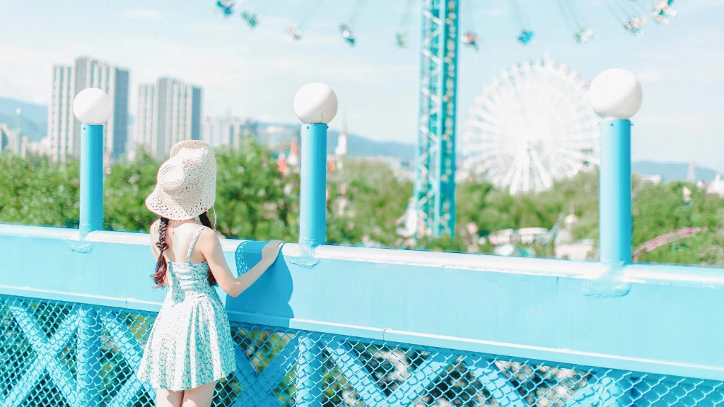 Summer Dress Straw Hat Ferris Wheel Cityscape Blue Railing Amusement Park