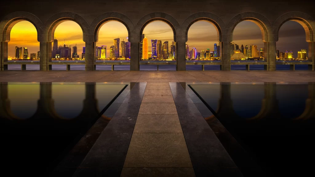 sunset cityscape reflection arches water