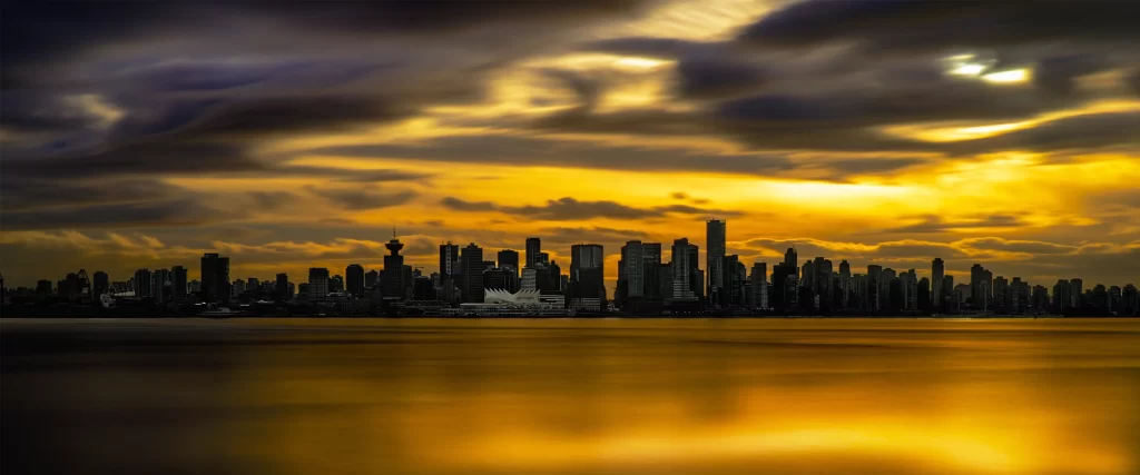 sunset cityscape skyline reflection clouds