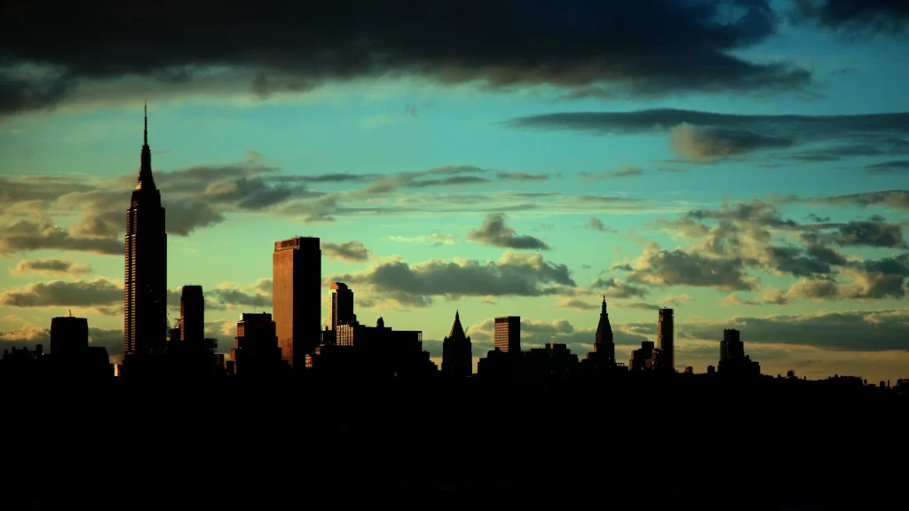 sunset cityscape skyscrapers clouds urban