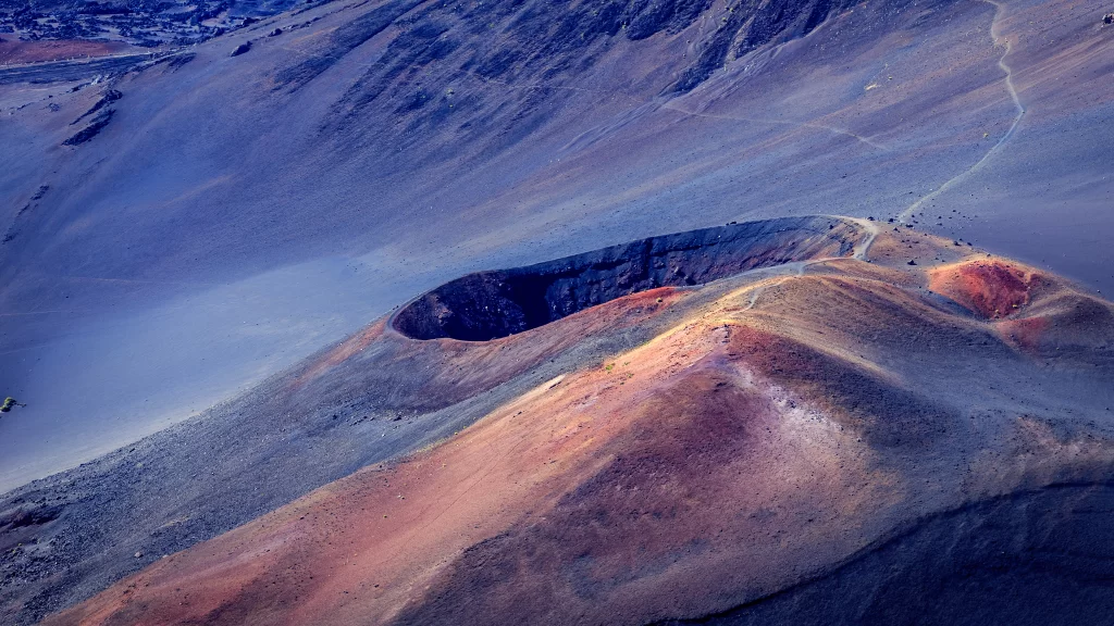 volcano landscape rugged terrain crater earthy tones