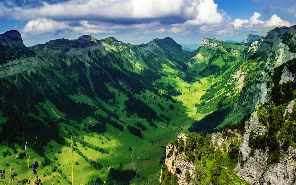 Mountainous Landscape Greenery Trails Peaks Clouds
