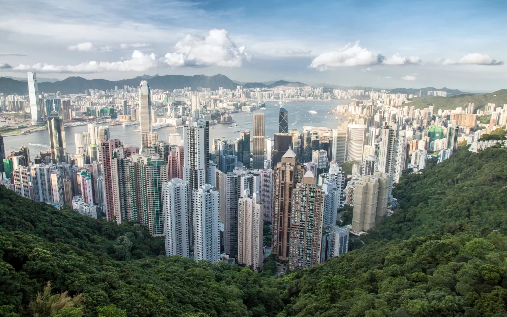 Urban Skyscrapers River Mountains Greenery Cityscape