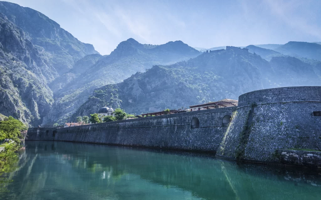 Mountain Fortress Ancient Walls River Reflections