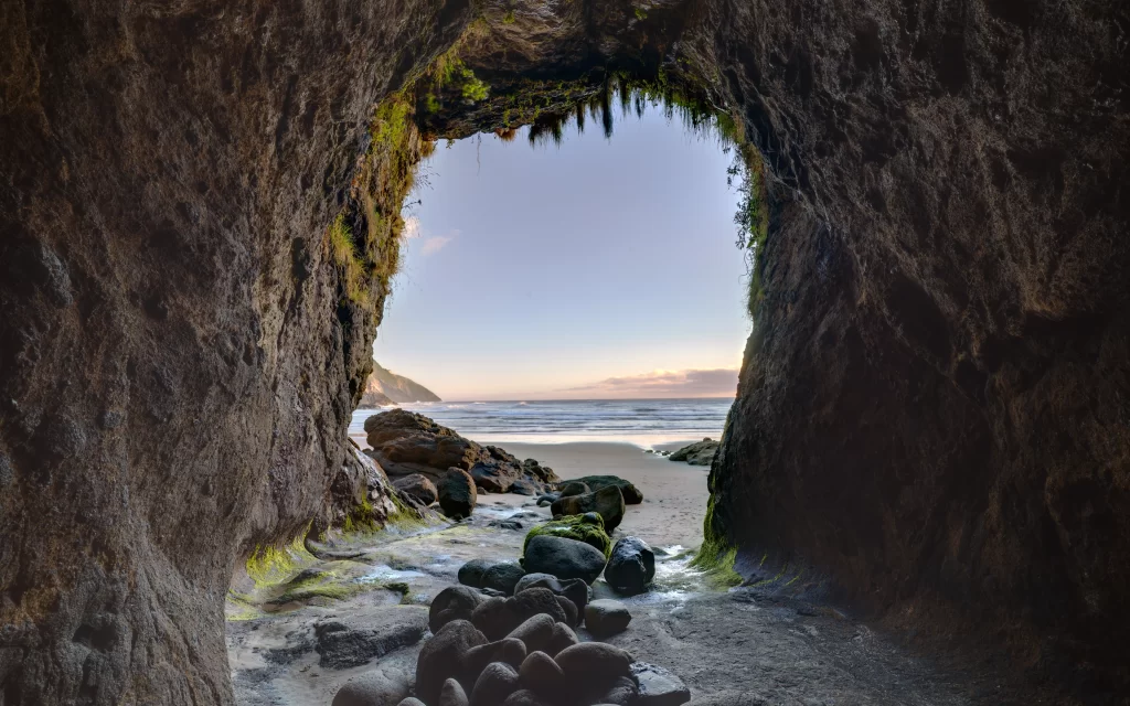 Beach Ocean Rocks Cave Sunset