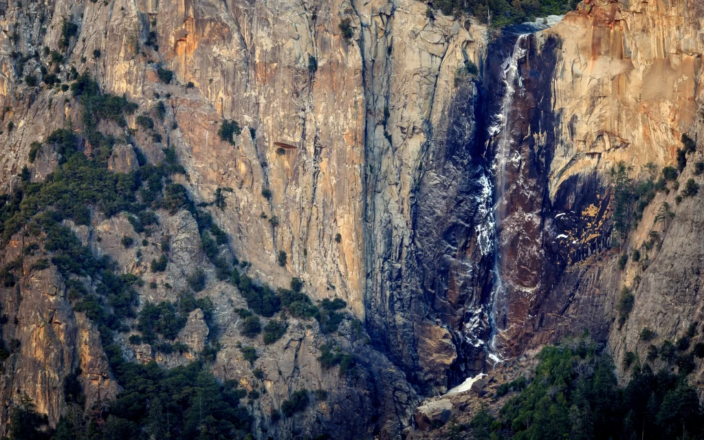 Mountainous Landscape Waterfall Rocky Terrain Verdant Vegetation