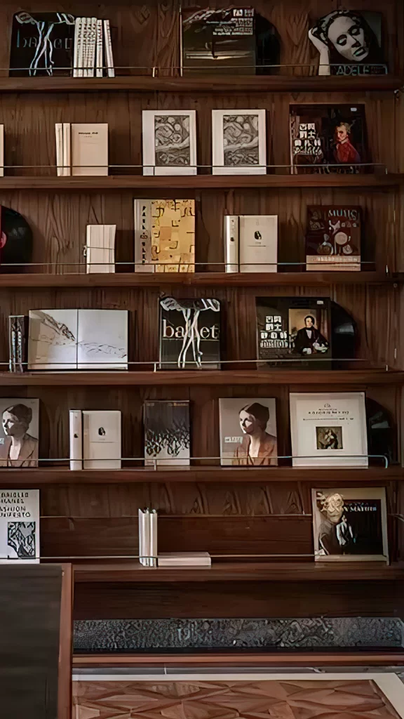 Walnut Bookshelf with Art Books and Vinyl Records