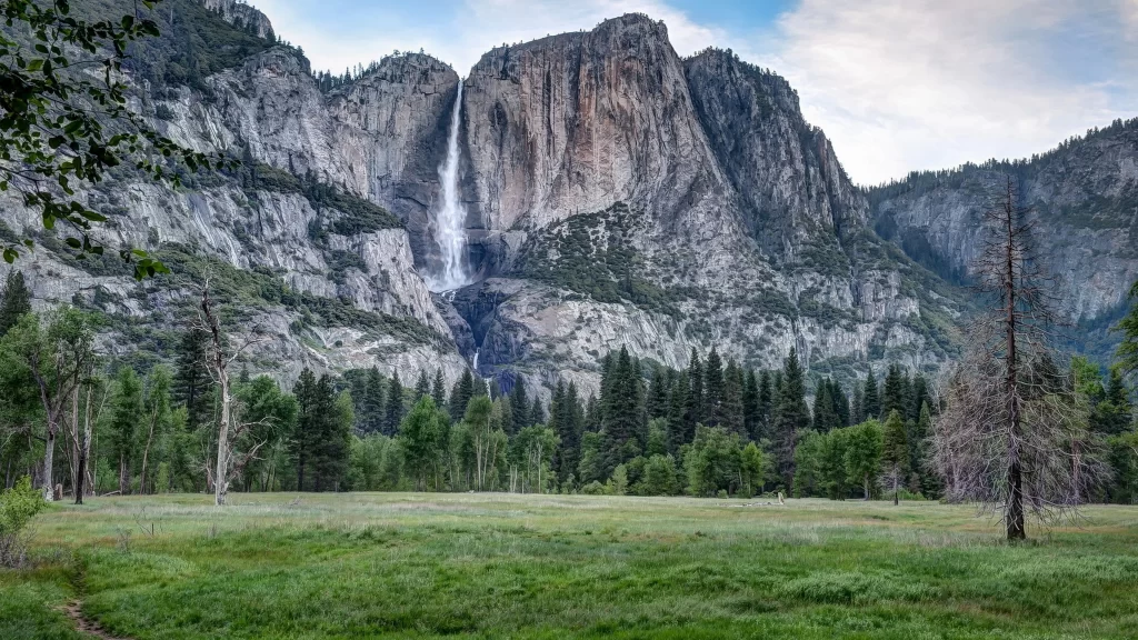 waterfall mountain green trees sky