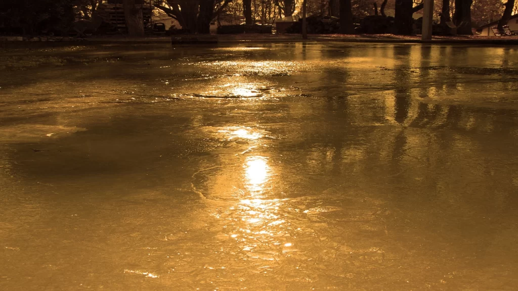wet ground reflection light puddle night street