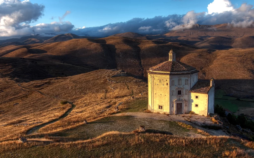 Historic Building Rolling Hills Golden Grass Cloudy Sky