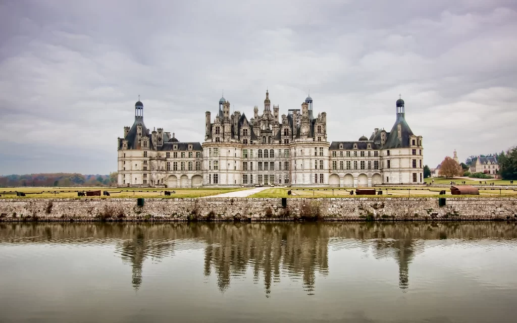 Medieval Castle Reflective Water Sky Clouds