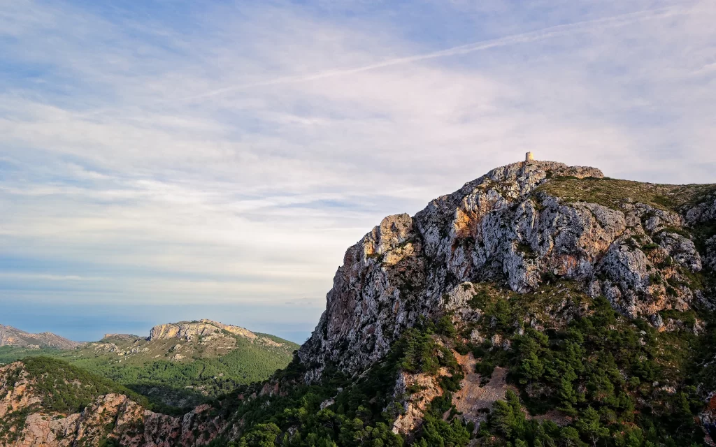 Mountainous Terrain Tower Sky Clouds Greenery