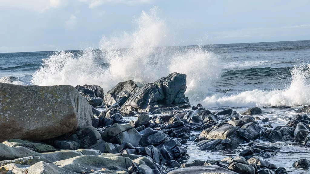 Ocean Waves Rocks Seafoam Blue Sky Clouds