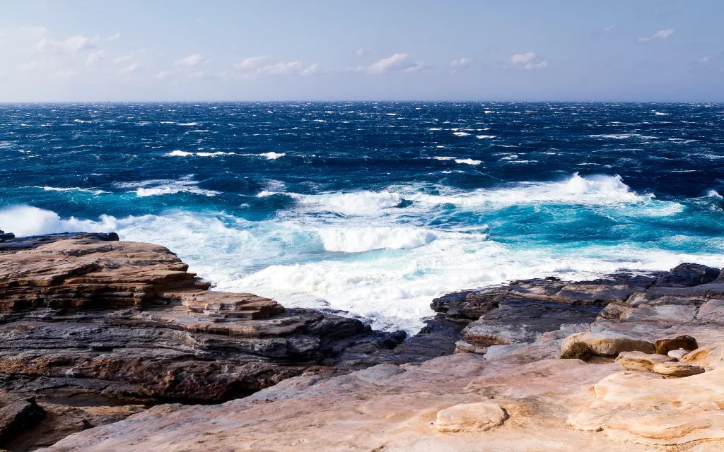 Ocean Waves Rocky Shoreline Blue Sky Clouds