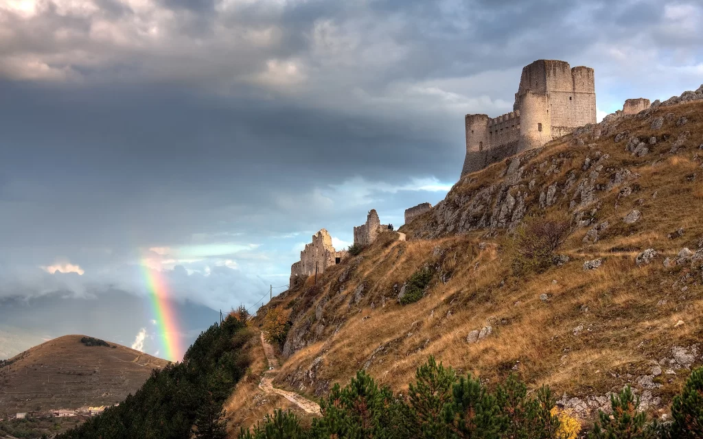 Rainbow Castle Ruins Hillside Clouds Nature