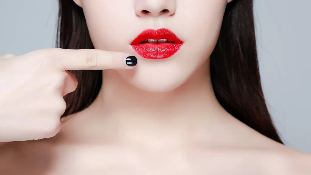 Red Lipstick Finger Pose Beauty