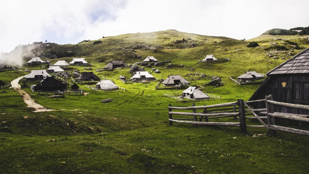 Rural Countryside Wooden Houses Green Hills Pasture Misty Atmosphere