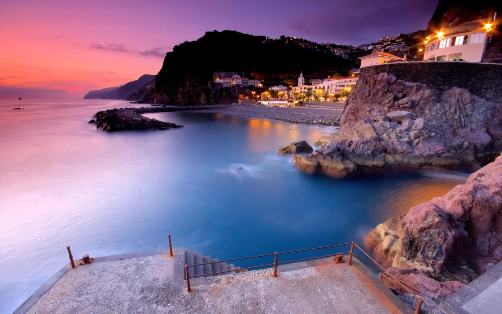 Sunset Ocean Rocks Village Lights Sky