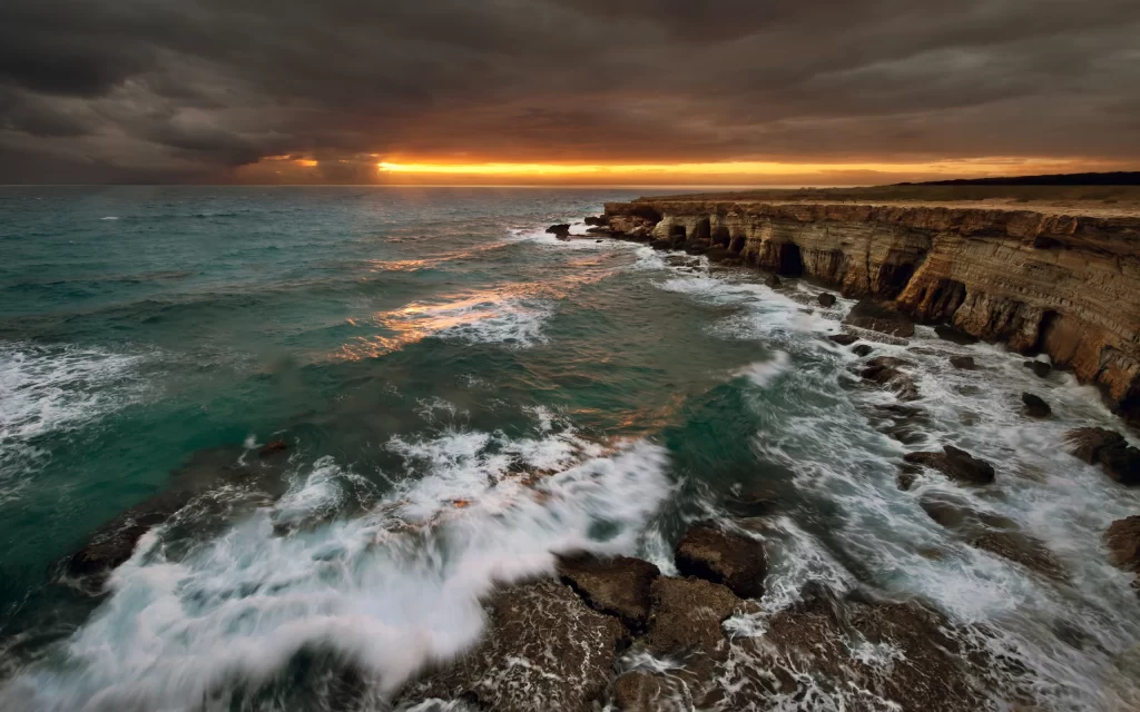 Sunset Ocean Waves Cliffs Stormy Sky